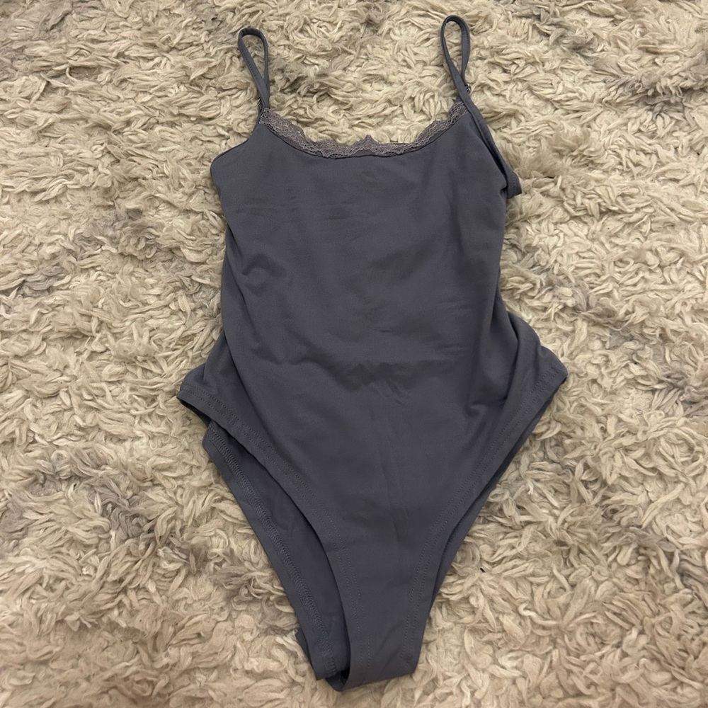 NWOT BLUE BODYSUIT